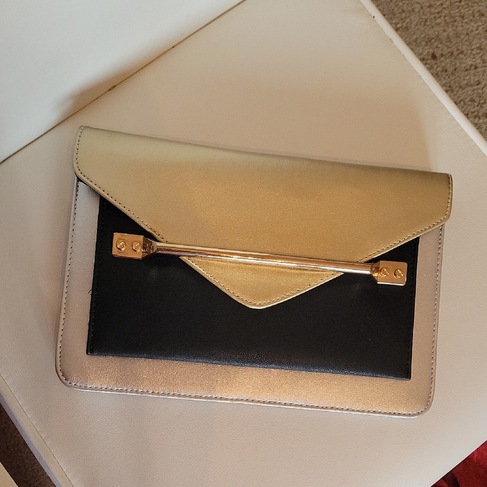 Aldo Gold and Black Clutch